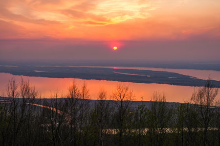 The sunset and river beyond the horizonの写真素材
