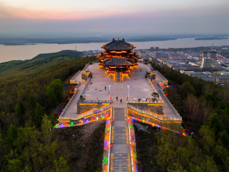 Aerial cityscape of downtown of temple and Fuyuan city is the most eastern point of China, border crossing between China and Russia.の写真素材