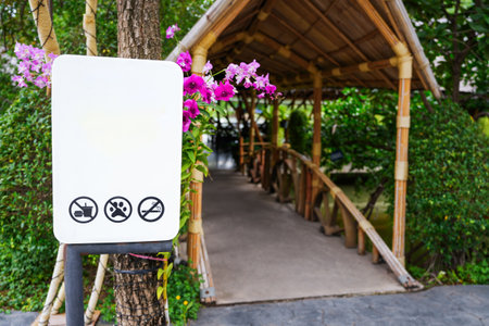 The empty white board with sign at the entrance of buildingの写真素材
