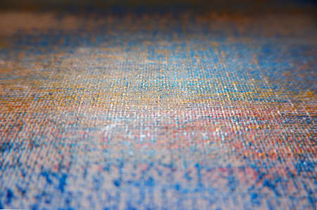 Acrylic painted on canvas. Flat lay, overlay or backdrop. Texture background. Gold, silver, and blue colors. Copy space for text, product display. Middle-top view.の写真素材