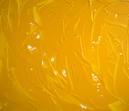 Acrylic yellow color painting abstract on canvas. Hand drawn art. Flat lay, overlay, backdrop, artwork, texture background concept. Copy space. Modern, contemporary. Taken from original artwork.の写真素材