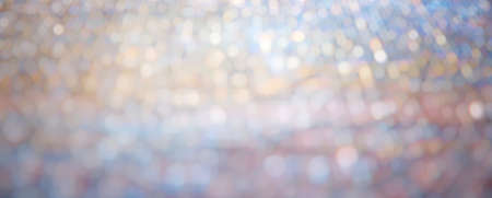 Bokeh of colorful multicolored glitter diamond texture. Any purpose of background, backdrop, banner, celebration, anniversary, festive theme, Christmas, etc.の写真素材