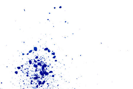 Fresh vivid blue color powder, spot on white background. Colourful granular material of pastels or crayons isolation. Artistic creative backdrop, design.の写真素材
