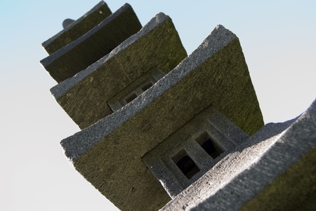 small Buddhist temple tower made of stoneの写真素材