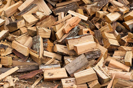 Hardwood pile ready to be used as firewoodの写真素材