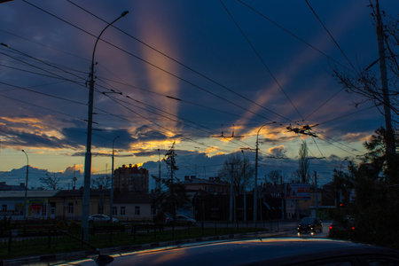 Sun shines in cloudsの写真素材