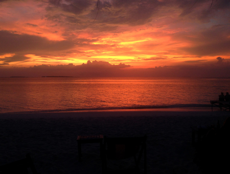 Beautiful Hot red Sunset or Sunrise over the Oceanの写真素材