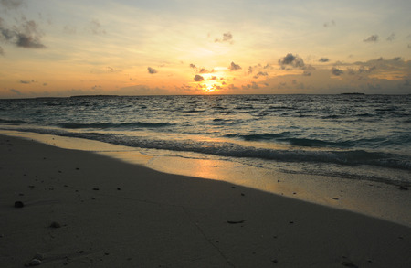 Beautiful Golden Sunset or Sunrise over the Oceanの写真素材