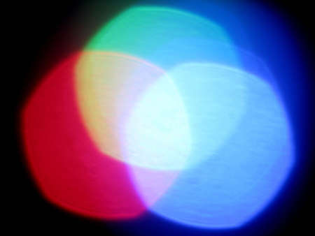 three colores mixed together to make a backgroundの写真素材