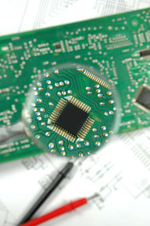 printed circuit board and magnifying glass