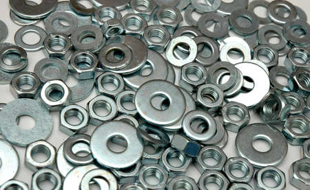 many different washers and nuts together