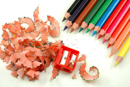 Sharpened coloured pencils, swarf of wood and sharpenerの写真素材