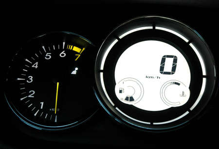 Speedometer and tachometer on dashboard