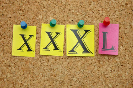 XXXL pinned on noticeboardの写真素材