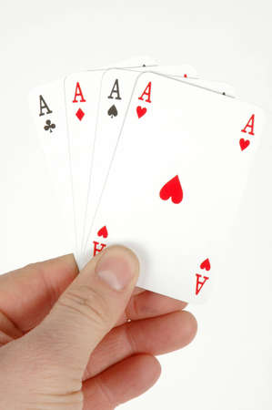Four Aces in hand- playing cards