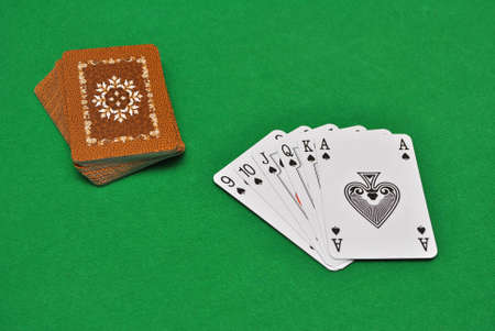 pack of playing card on green  casino tableのeditorial素材