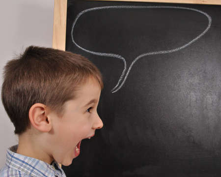 The young boy is screamingの写真素材