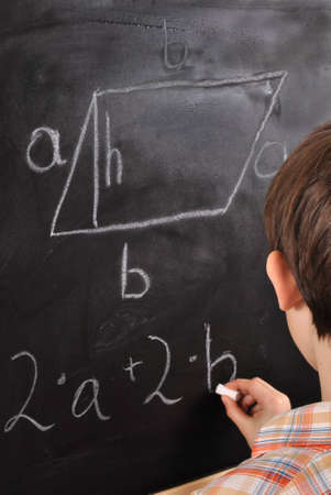 Parallelogram-student by the blackboard