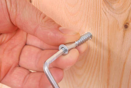 Assembling furniture with using toolsの写真素材