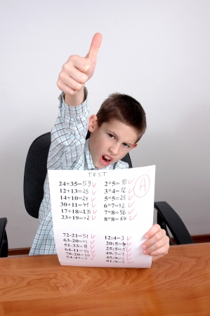 boy gets A grade on math testの写真素材
