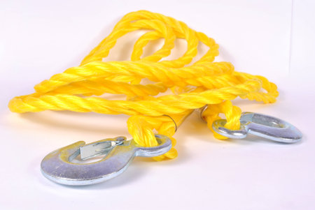 Yellow tow cord on white backgroundの写真素材