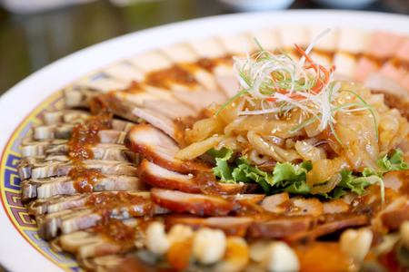 The various Chinese appetizers arranged in the big plate.の写真素材