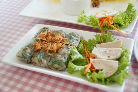 Various dishes of Vietnams food on the table.