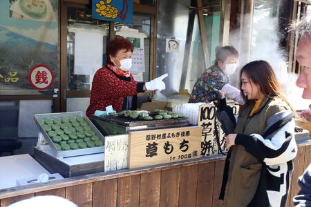 Oshino Hakkai, Japan - April 11, 2019: The dango food shop in Oshino Hakkai village, Japan.