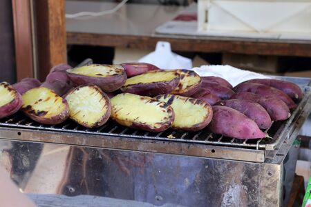 The Japanese poatato grilled on the hot stove.のeditorial素材