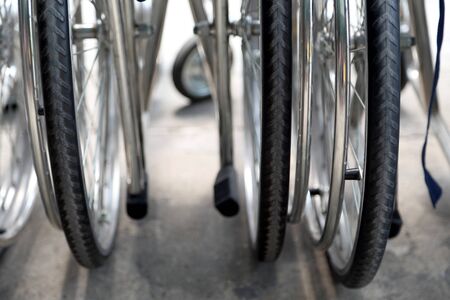 The group of wheelchairs parking.