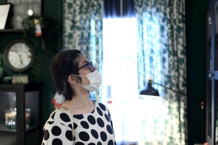 The Asian woman going shopping with face mask.の写真素材