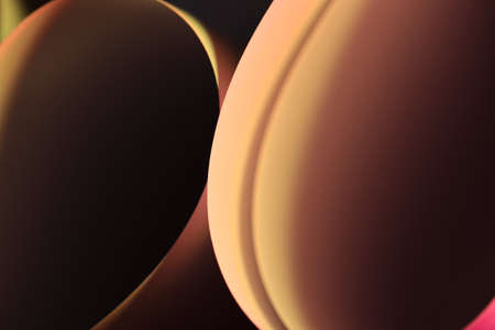 The abstract picture of curved paper in vivid colours.