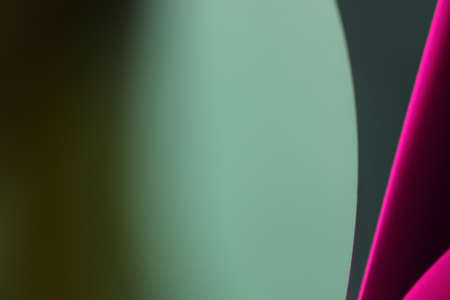 The abstract picture of curved paper in vivid colours.の写真素材