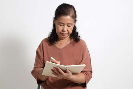 The Asian elder femaleon the white background.