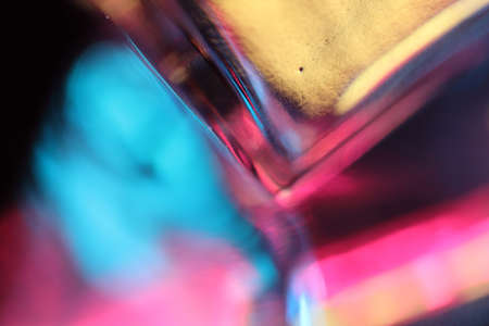 The macro picture of glass in vivid color light.