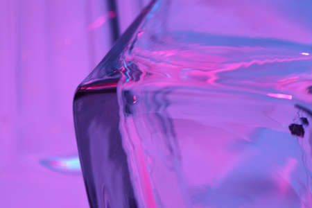 The macro picture of glass in vivid color light.の写真素材