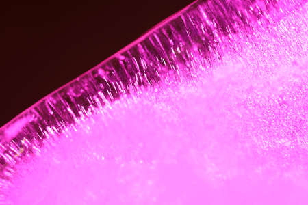 The macro picture of ice in color gel light photography.