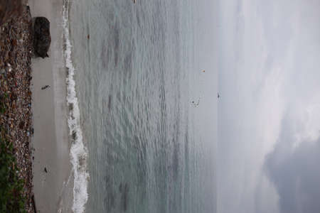 Namsai beach, the beautiful clear sea in the raining day from Thailand.