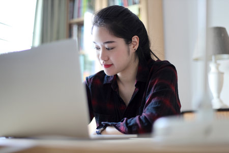 The Asian woman working from home.の写真素材