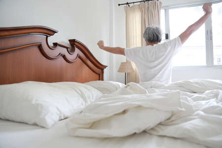 The senior Asian man in the bedroom.の写真素材
