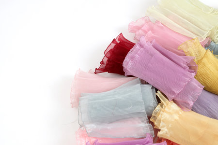 The group of Thai pleat shawl on the white background.