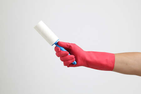 The pink gloves on the white background.
