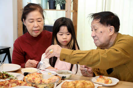 Chinese family have variety food togethrer.の写真素材