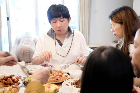 Chinese family have variety food togethrer.