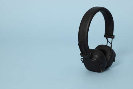 The isolated headphones on the blue background.
