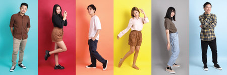 Portraits of diverse individuals of different ages and emotions on vibrant studio backgrounds, showcasing personality and cultural diversity.の写真素材