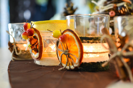 Handmade candle decor. Candle in glass jar, pine boughs, epsom salt, twineの写真素材
