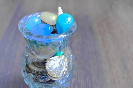 Colorful semiprecious stones in a glass vase. closeupの写真素材