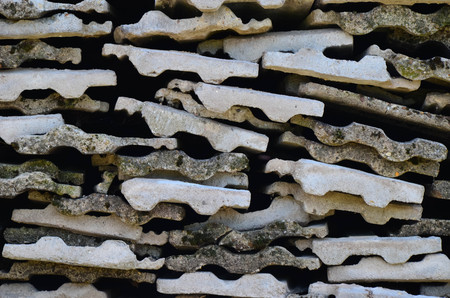 Background texture of old gray concrete fence with square pattern and concrete platesの写真素材
