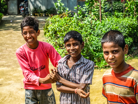 Amroha, Uttar Pradesh, INDIA - 2011: Indian children of slams smilimg boysのeditorial素材